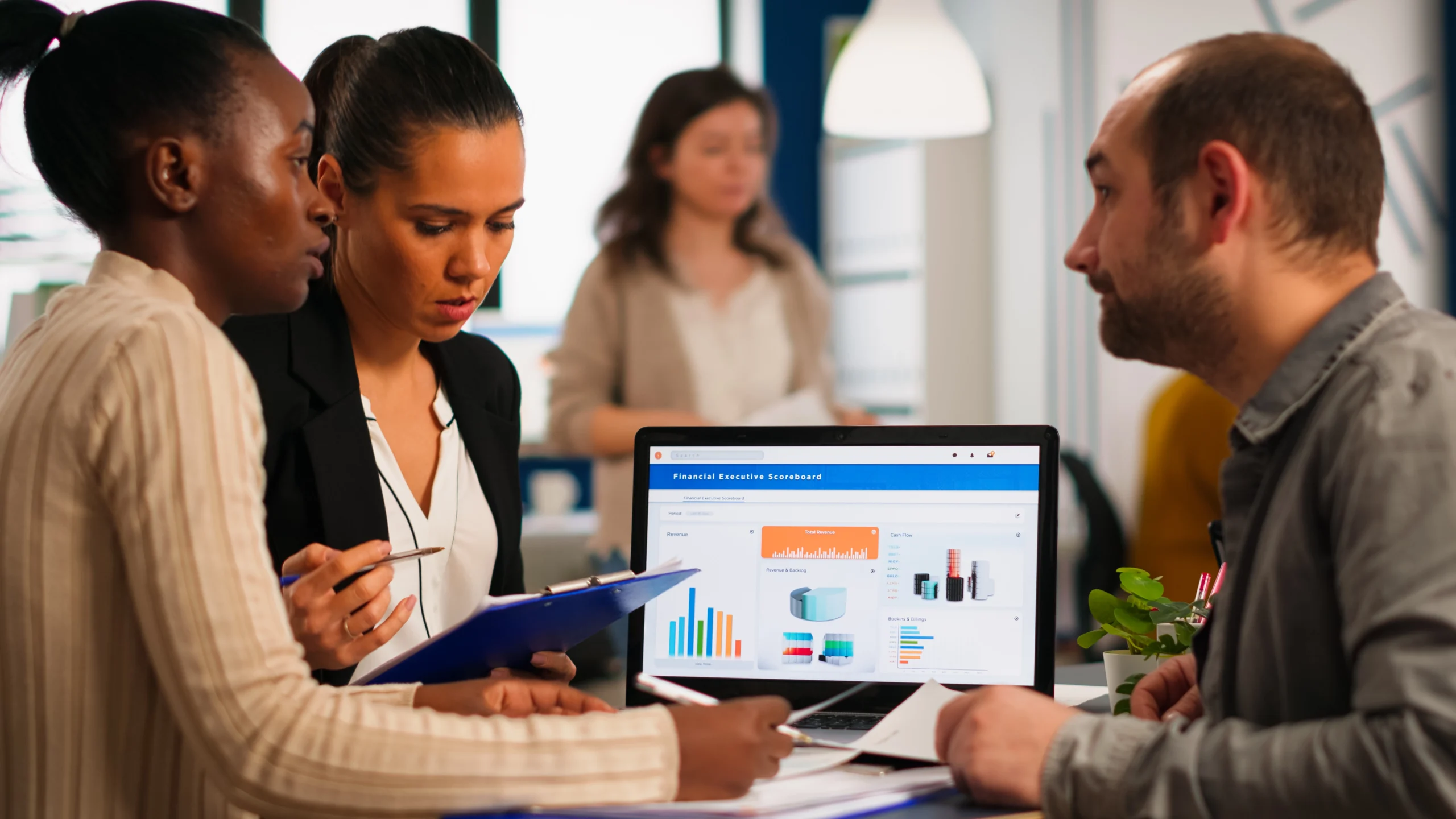 Employs of TecSmiths discussing a clients business